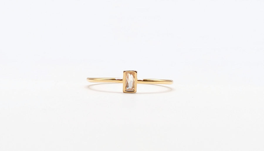 Bague serti carre